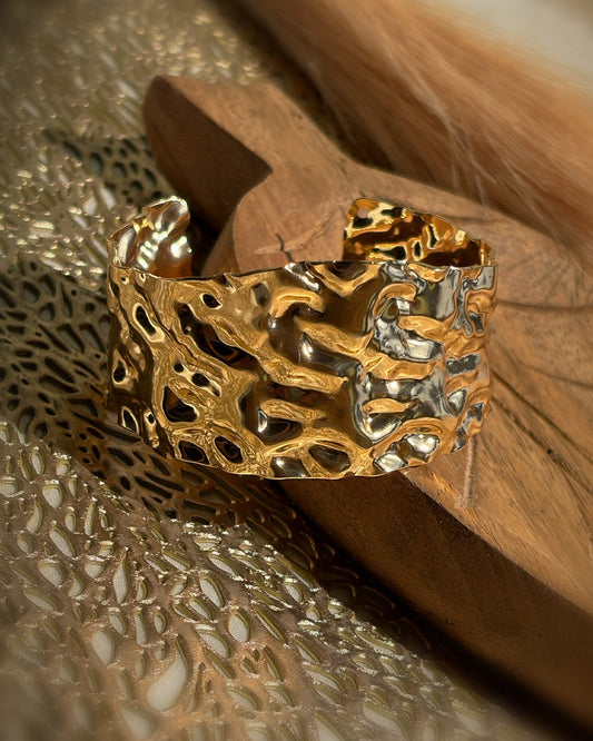 Close up of Molten Gold Cuff Bracelet featuring an organic sculpted texture