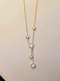 Ivory Clover Cascade Necklace with ivory clover charms on a delicate gold-tone cascading Y-chain