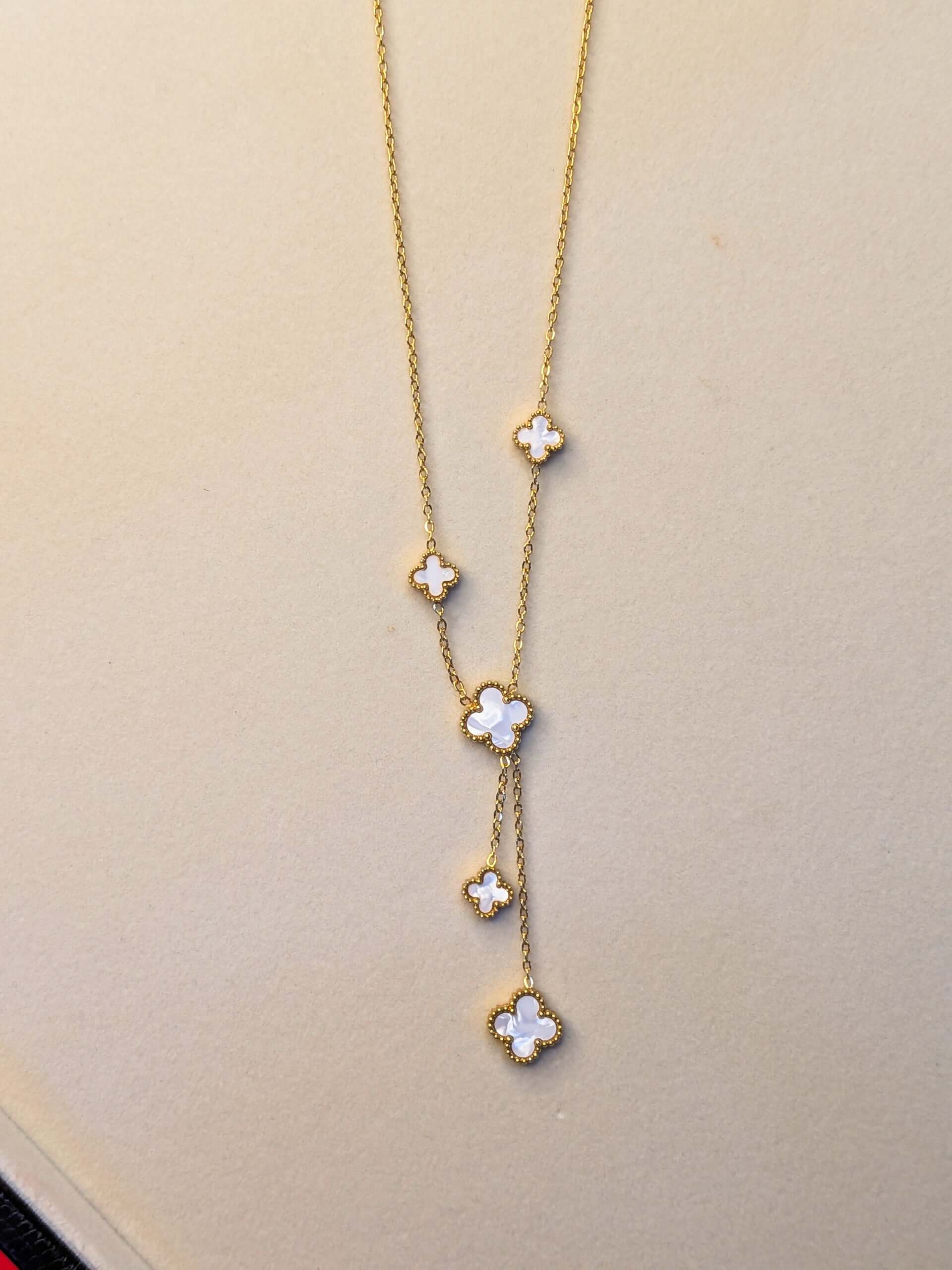 Elegant ivory clover cascade necklace with premium gold finish and anti tarnish coating
