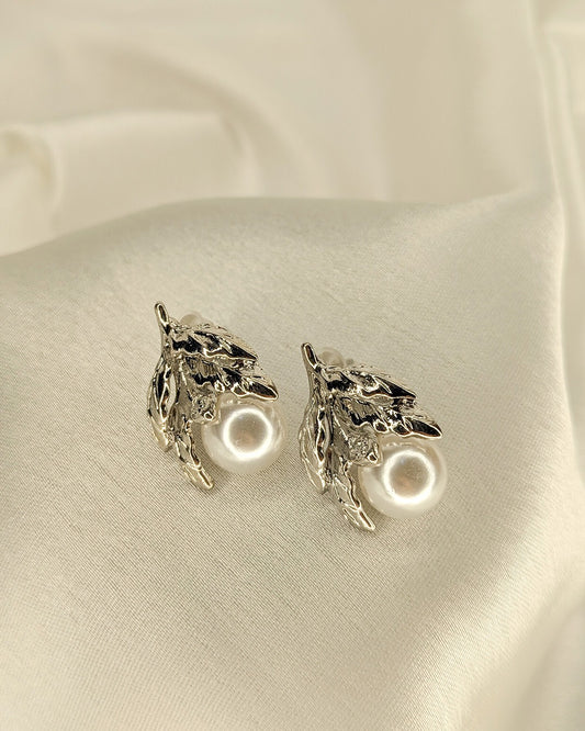 Luxury silver pearl earrings with botanical leaf detailing and timeless styling