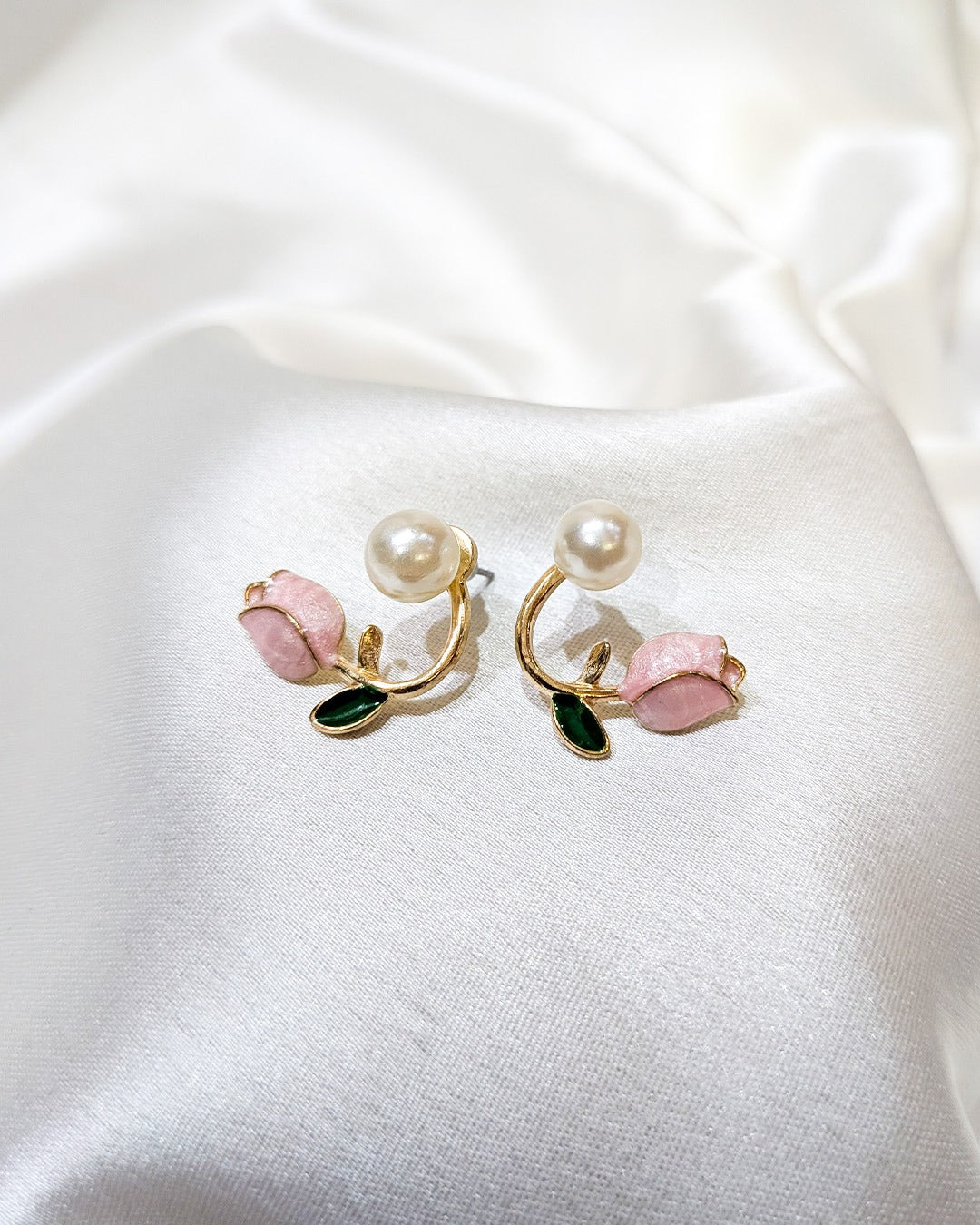Rose Pearl Bloom Earrings featuring pink rose buds, pearl accents and anti tarnish gold finish
