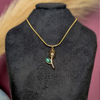 Tulip pendant necklace with emerald green leaf accent